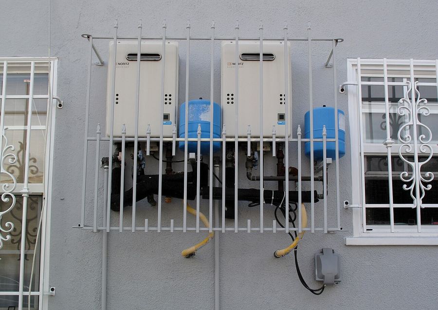 Wall-mounted tankless water heaters
