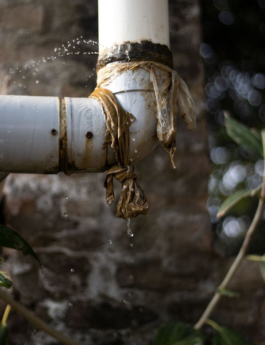 A failed pipe joint leaking water