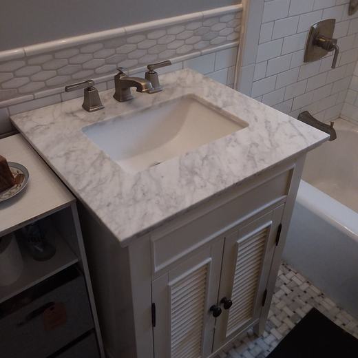 Marble-top vanity installation